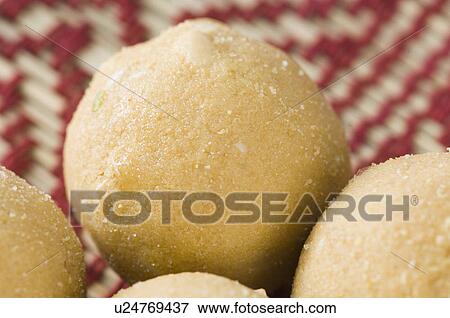 Close-up of four bean Ladoos View Large Photo Image Stock Photo - Close-up of four bean Ladoos. Fotosearch