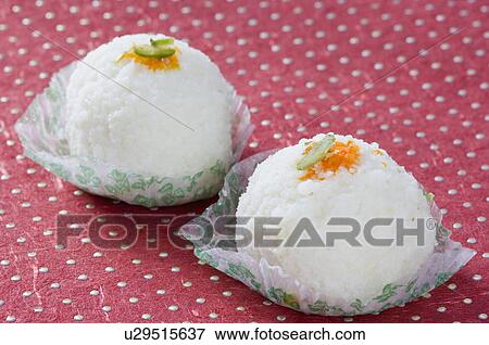 Stock Photo - Close-up of two Rasgullas. Fotosearch
