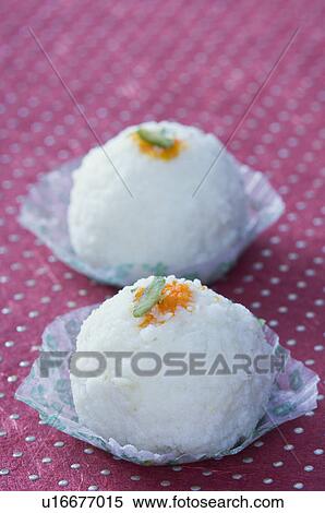 Stock Photography - Close-up of two Rasgullas. Fotosearch