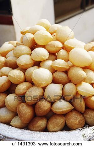 Stock Image - High angle view of Pani Puris. Fotosearch
