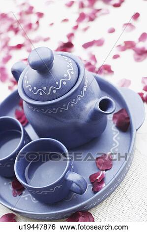 High angle view of tea set on the table View Large Photo Image Stock Photograph - High angle view of tea set on the table. Fotosearch