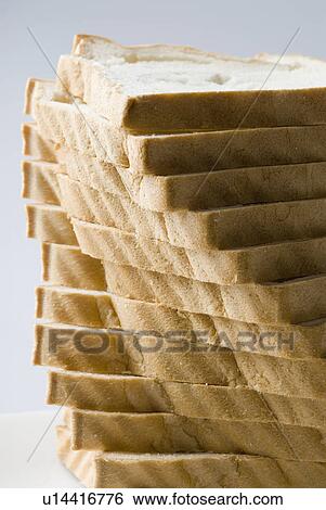Close-up of a stack of bread View Large Photo Image Stock Photograph - Close-up of a stack of bread. Fotosearch