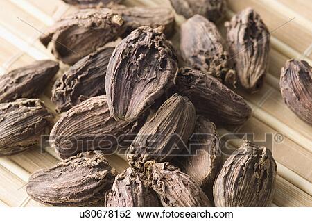 Stock Image - Close-up of Black Cardamoms. Fotosearch