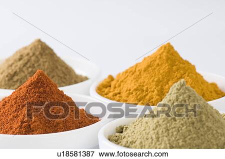 Close-up of four bowls of spices View Large Photo Image Stock Photo - Close-up of four bowls of spices. Fotosearch