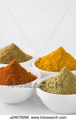 Close-up of four bowls of spices View Large Photo Image Stock Photograph - Close-up of four bowls of spices. Fotosearch