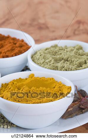 Close-up of spices in three bowls View Large Photo Image Picture - Close-up of spices in three bowls. Fotosearch