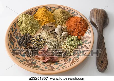 Close-up of spices on a plate View Large Photo Image Stock Photo - Close-up of spices on a plate. Fotosearch