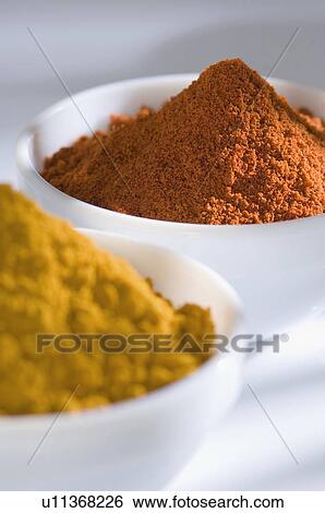 Close-up of two bowls of spices View Large Photo Image Stock Photograph - Close-up of two bowls of spices. Fotosearch