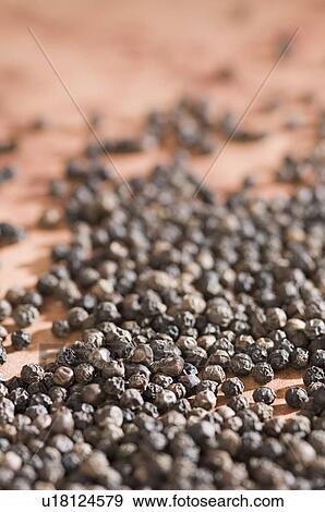 Stock Photo - High angle view of Black Peppercorns. Fotosearch