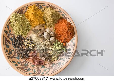 High angle view of spices in a plate View Large Photo Image Stock Photo - High angle view of spices in a plate. Fotosearch