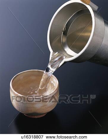 Stock Photo - Sake With Japanese Metal Container. Fotosearch