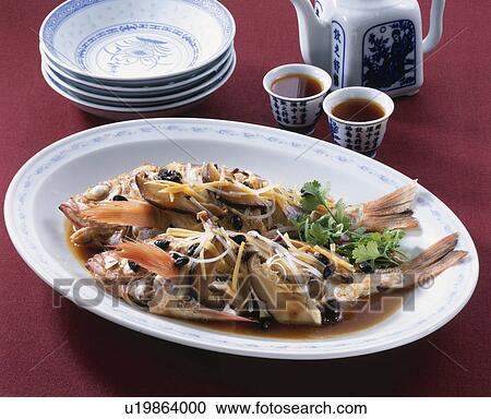 Stock Image - Chinese Style Steamed Black Rockfish. Fotosearch