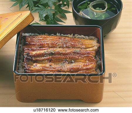 Stock Image - Broiled Eels On Rice. Fotosearch