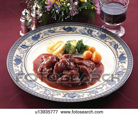 Stock Photo - Chicken Boiled With Red Wine. Fotosearch