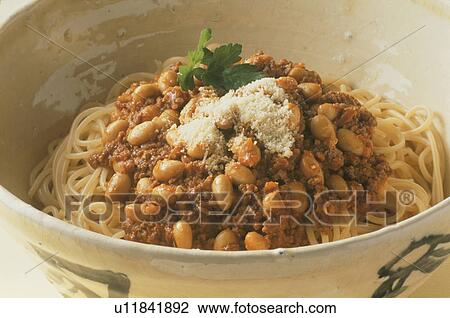 Stock Image - Meat Sauce Spaghetti With Boiled Egg. Fotosearch