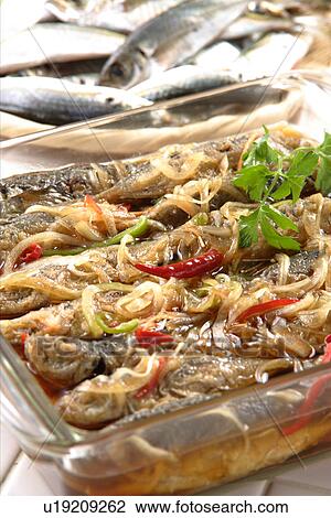 Stock Image - Scad Marinated With Spicy Sauce. Fotosearch