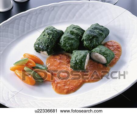 Stock Image - Spinach Volume Tomato Sauce Of Hairtail. Fotosearch