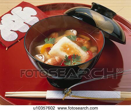 Stock Image - Kanto Rice Cakes In Vegetable Soup. Fotosearch