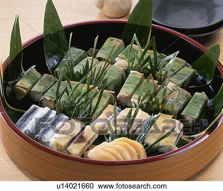 Sushi Wrapped In Bamboo Grass View Large Photo Image Stock Image - Sushi Wrapped In Bamboo Grass. Fotosearch
