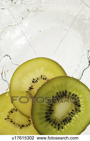 Stock Image - kiwi, cooking, foods, foodstuffs, grocery, organics, seeds. Fotosearch