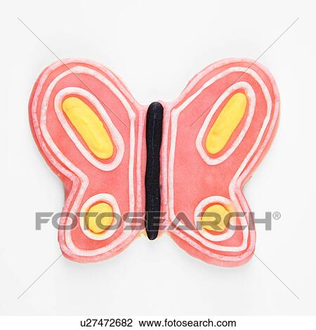 Stock Image - Butterfly sugar cookie with decorative icing.. Fotosearch