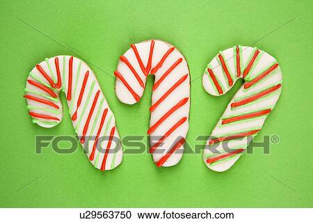 Candy cane sugar cookies with decorative icing. View Large Photo Image Stock Image - Candy cane sugar cookies with decorative icing.. Fotosearch