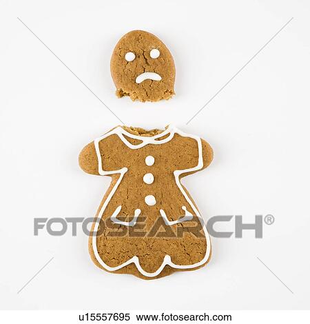 Frowning female gingerbread cookie broken in half. View Large Photo Image Stock Photography - Frowning female gingerbread cookie broken in half.. Fotosearch
