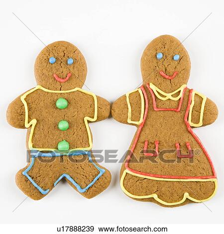 Male and female gingerbread cookies holding hands. View Large Photo Image Stock Photo - Male and female gingerbread cookies holding hands.. Fotosearch