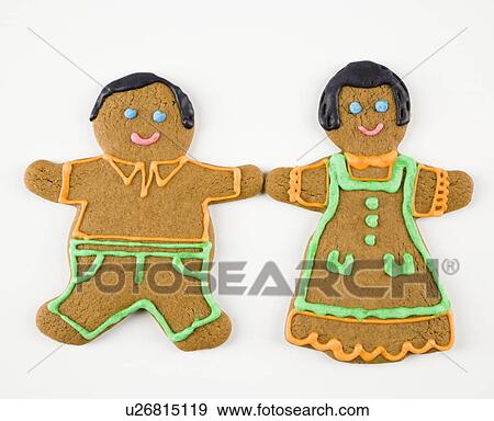 Male and female gingerbread cookies holding hands. View Large Photo Image Stock Photo - Male and female gingerbread cookies holding hands.. Fotosearch
