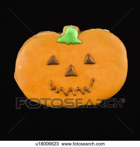 Sugar cookie in shape of pumpkin with decorative icing. View Large Photo Image Stock Image - Sugar cookie in shape of pumpkin with decorative icing.. Fotosearch