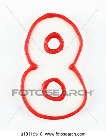 Stock Photo - Sugar cookie in the shape of a number eight outlined in red icing.. Fotosearch