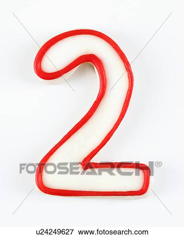 Sugar cookie in the shape of a number two outlined in red icing. View Large Photo Image Stock Photo - Sugar cookie in the shape of a number two outlined in red icing.. Fotosearch