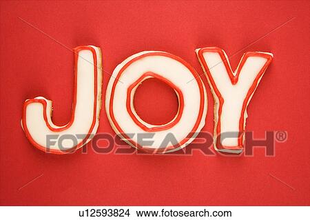 Sugar cookies with decorative icing that spell joy. View Large Photo Image Picture - Sugar cookies with decorative icing that spell joy.. Fotosearch