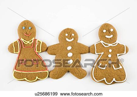 Three male and female gingerbread cookies holding hands. View Large Photo Image Stock Photo - Three male and female gingerbread cookies holding hands.. Fotosearch