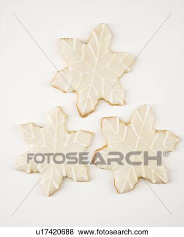 Three snowflake sugar cookies with decorative icing. View Large Photo Image Stock Photo - Three snowflake sugar cookies with decorative icing.. Fotosearch