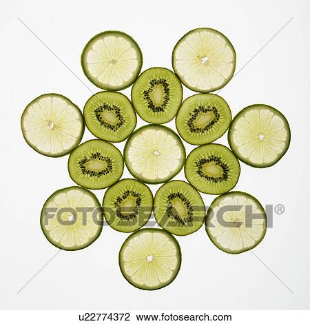 Kiwi and lime fruit slices arranged on white background. View Large Photo Image Stock Image - Kiwi and lime fruit slices arranged on white background.. Fotosearch