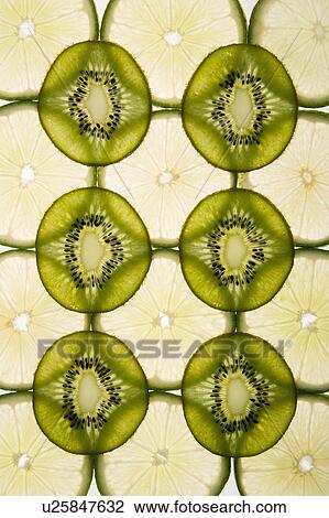 Lime and kiwi fruit slices arranged on white background. View Large Photo Image Stock Image - Lime and kiwi fruit slices arranged on white background.. Fotosearch