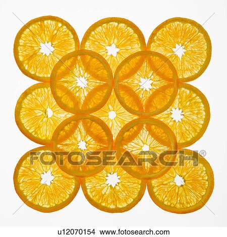 Picture - Orange slices arranged in square design on white background.. Fotosearch