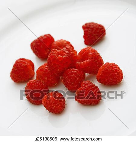 Red raspberries on white background. View Large Photo Image Stock Photograph - Red raspberries on white background.. Fotosearch