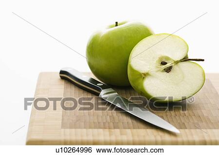Still life of green apples and knife on cutting board. View Large Photo Image Stock Photograph - Still life of green apples and knife on cutting board.. Fotosearch