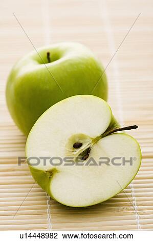 Still life of whole and sliced green apples. View Large Photo Image Stock Image - Still life of whole and sliced green apples.. Fotosearch