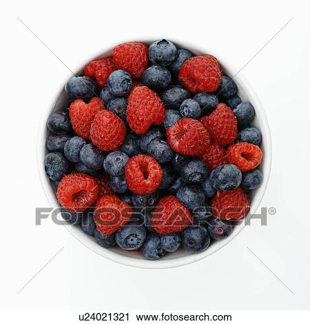 Bowl of mixed blueberries and raspberries on white background. View Large Photo Image Stock Image - Bowl of mixed blueberries and raspberries on white background.. Fotosearch