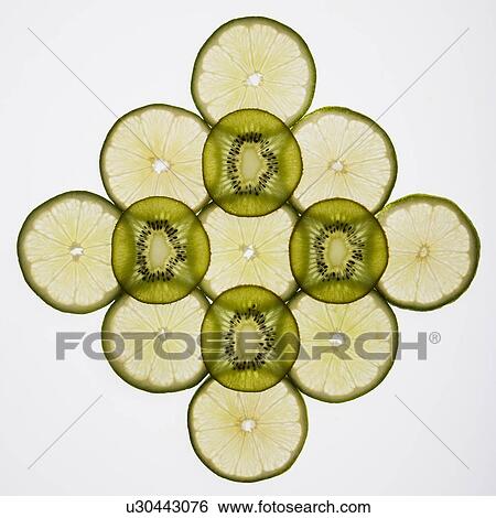 Lime and kiwi fruit slices arranged on white background. View Large Photo Image Stock Photograph - Lime and kiwi fruit slices arranged on white background.. Fotosearch