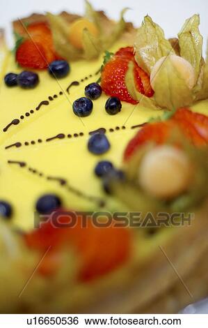 Stock Photograph - Detail of lemon fruit flan dessert. Fotosearch