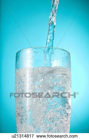 Water pouring into nearly full glass View Large Photo Image Stock Photo - Water pouring into nearly full glass. Fotosearch