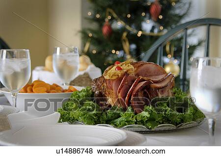 Holiday ham dinner table setup View Large Photo Image Stock Photo - Holiday ham dinner table setup. Fotosearch
