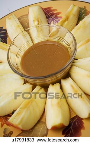 Plate of apples with caramel dip View Large Photo Image Stock Image - Plate of apples with caramel dip. Fotosearch