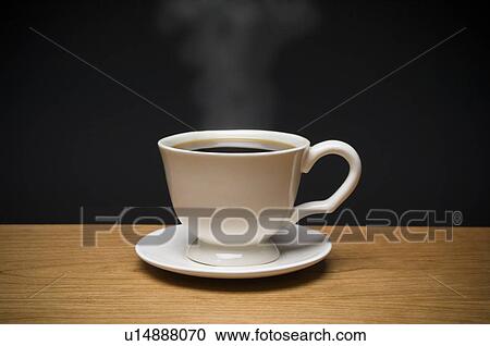 Stock Image - Steaming cup of coffee. Fotosearch