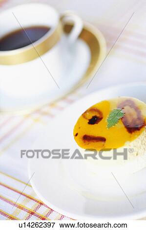 Stock Photo - Cake and a cup of coffee. Fotosearch