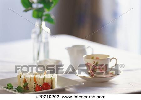 Sandwiches and a cup of coffee View Large Photo Image Stock Photo - Sandwiches and a cup of coffee. Fotosearch